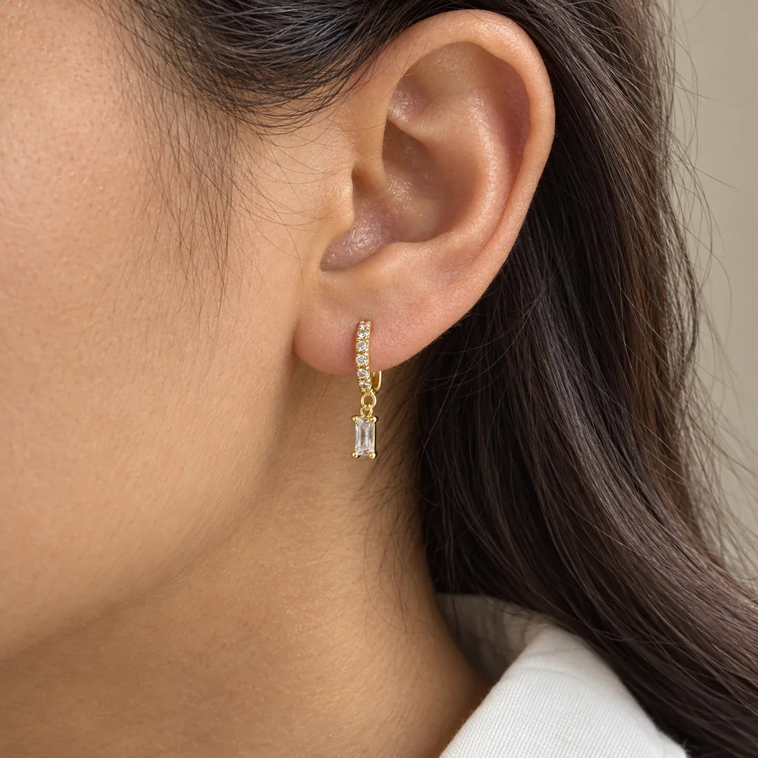 Baguette Drop Piercing worn on an adult model ear