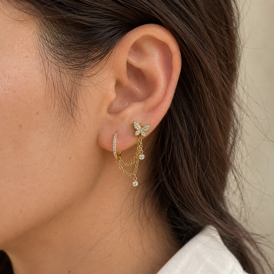 Butterfly Cascade Piercing worn on an adult model ear