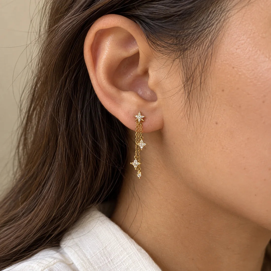 Celestial Trail Piercing worn on an adult model ear