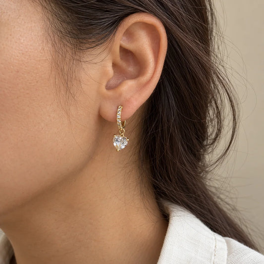 Crystal Heart Piercing worn on an adult model ear