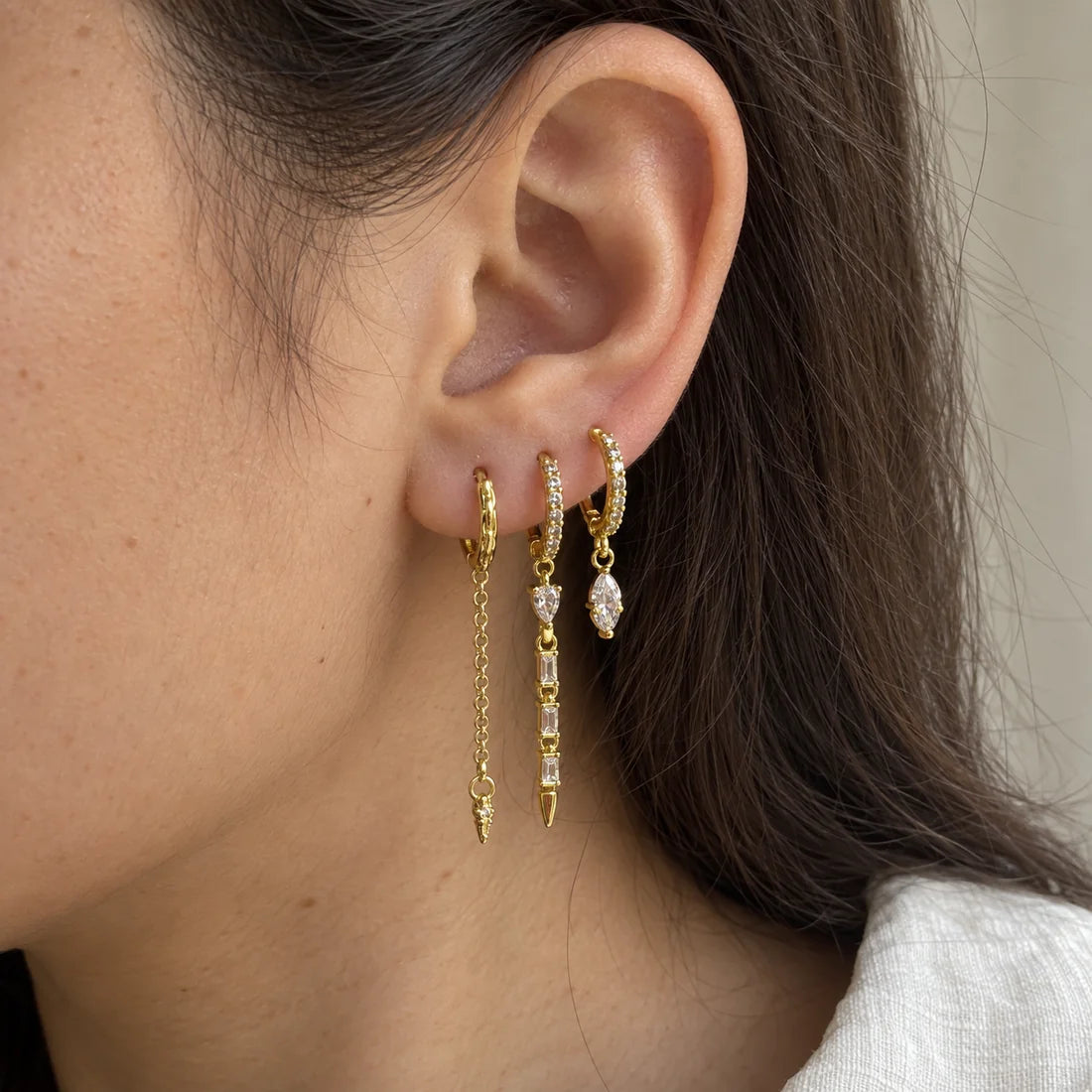 Dewdrop Chain Set worn on an adult model ear