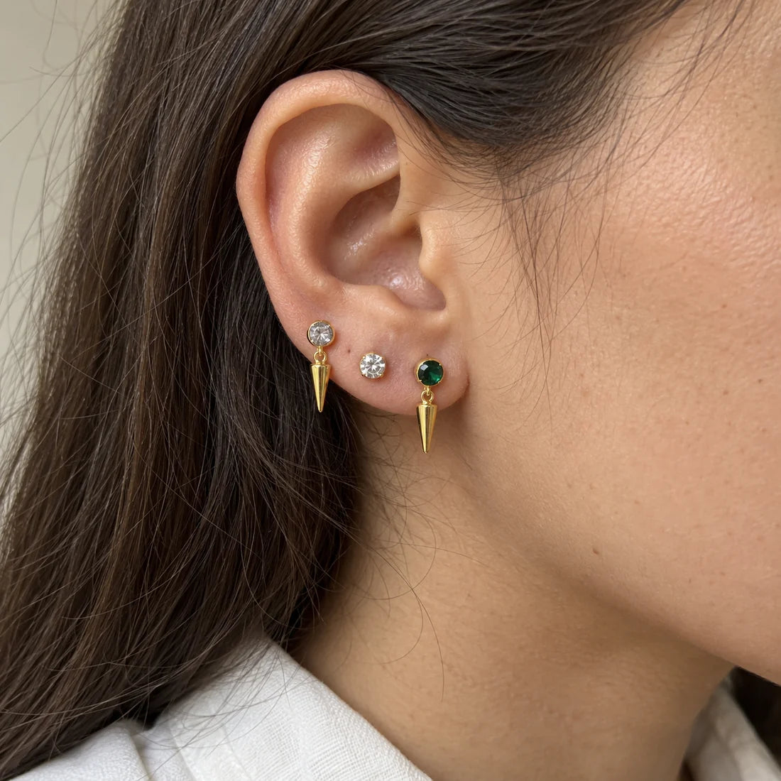 Emerald Spike Stud Set worn on an adult model ear