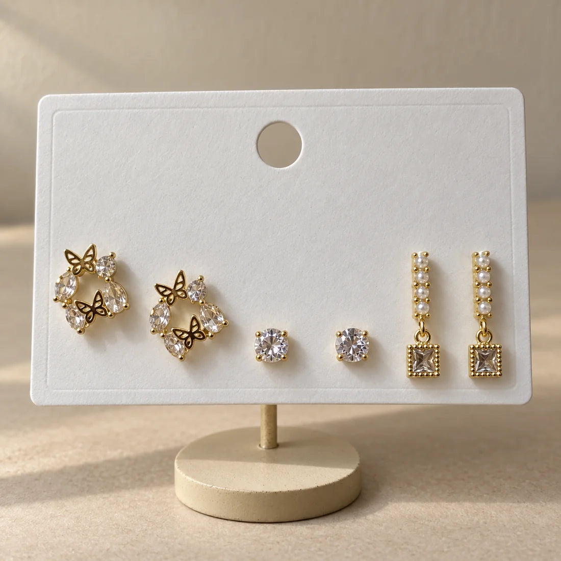 Butterfly Garden Stud Set displayed on an ivory jewelry card