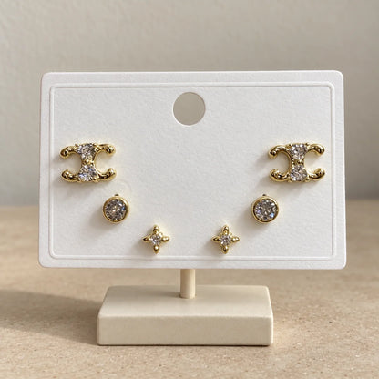 Celestial Curves Stud Set displayed on an ivory jewelry card