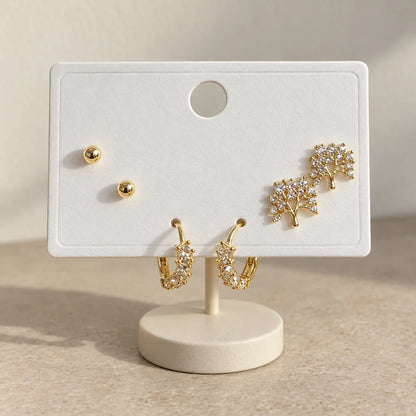 Crystal Blossom Hoops Set displayed on an ivory jewelry card