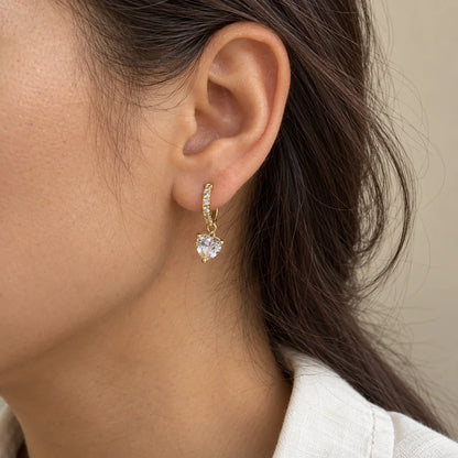 Crystal Heart Piercing worn on an adult model ear