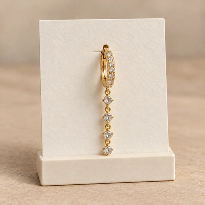 Crystal Line Piercing displayed on an ivory jewelry card
