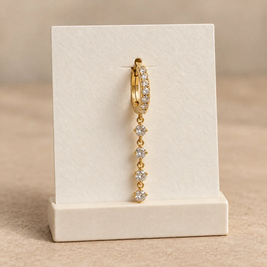 Crystal Line Piercing displayed on an ivory jewelry card