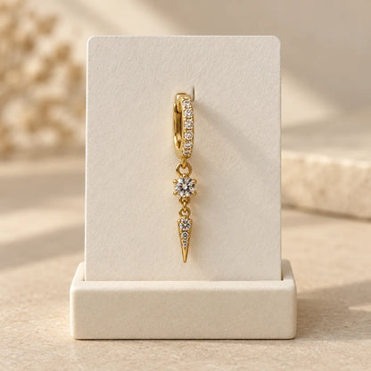 Crystal Spear Piercing displayed on an ivory jewelry card