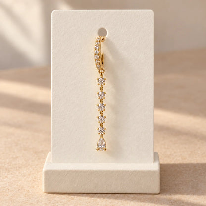 Crystal Stream Piercing displayed on an ivory jewelry card