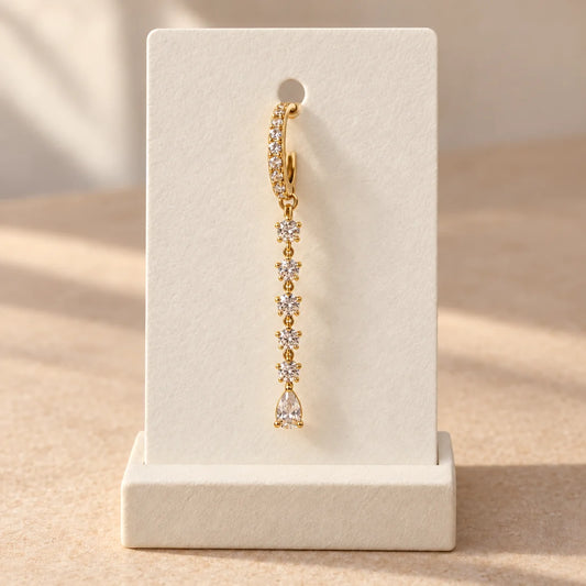 Crystal Stream Piercing displayed on an ivory jewelry card