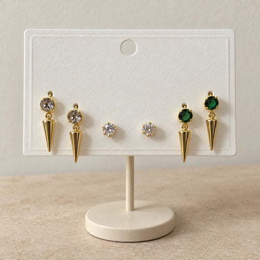 Emerald Spike Stud Set displayed on an ivory jewelry card