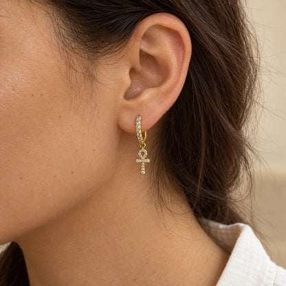 Golden Ankh Piercing worn on an adult model ear