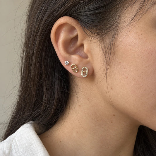 Golden Link Stud Set worn on an adult model ear