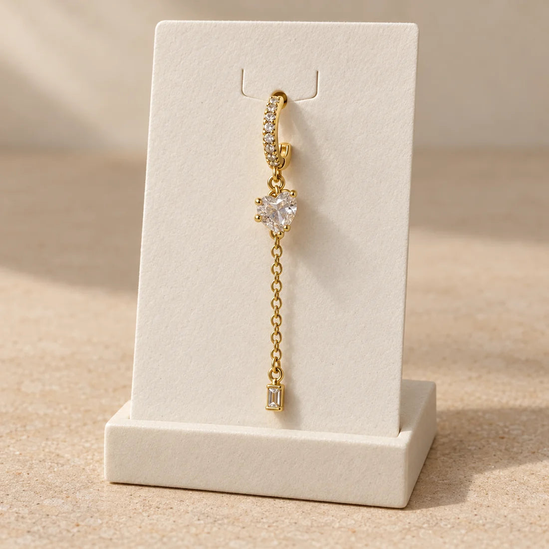 Heart Trail Piercing displayed on an ivory jewelry card