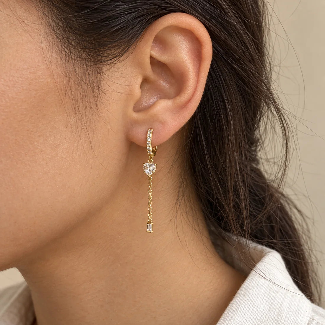 Heart Trail Piercing worn on an adult model ear