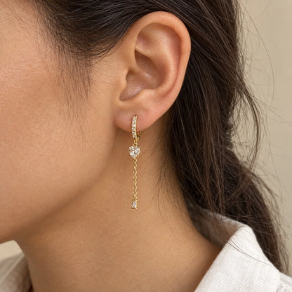 Heart Trail Piercing worn on an adult model ear