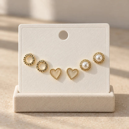 Pearl Heart Stud Set displayed on an ivory jewelry card