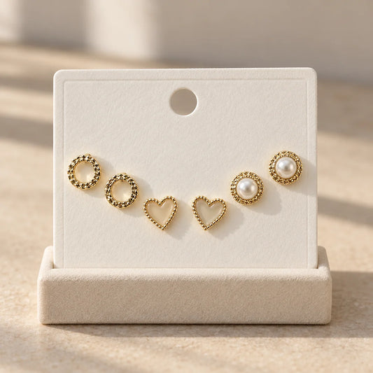 Pearl Heart Stud Set displayed on an ivory jewelry card