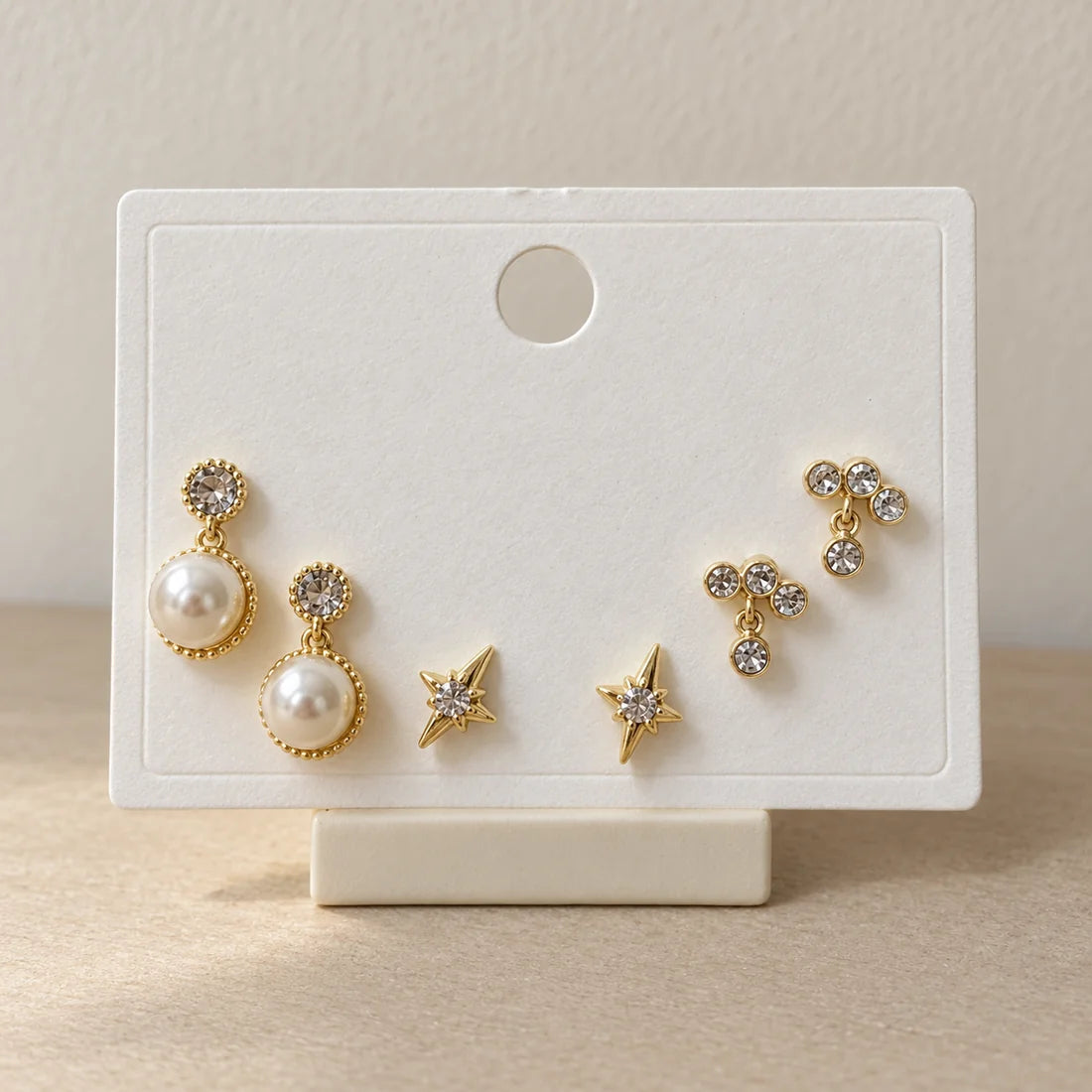 Pearl Starlight Stud Set displayed on an ivory jewelry card