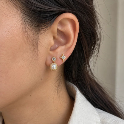 Pearl Starlight Stud Set worn on an adult model ear