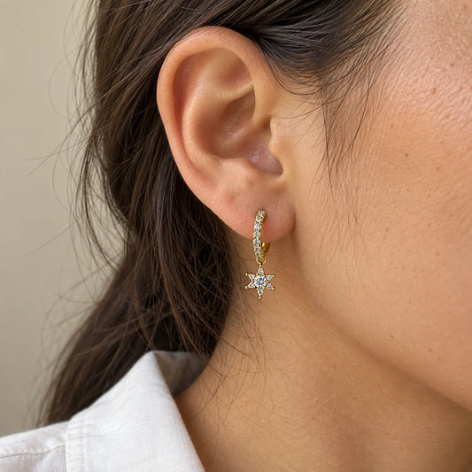 Starburst Hoop Piercing worn on an adult model ear