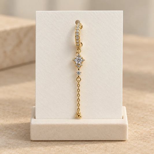 Starlight Trail Piercing displayed on an ivory jewelry card