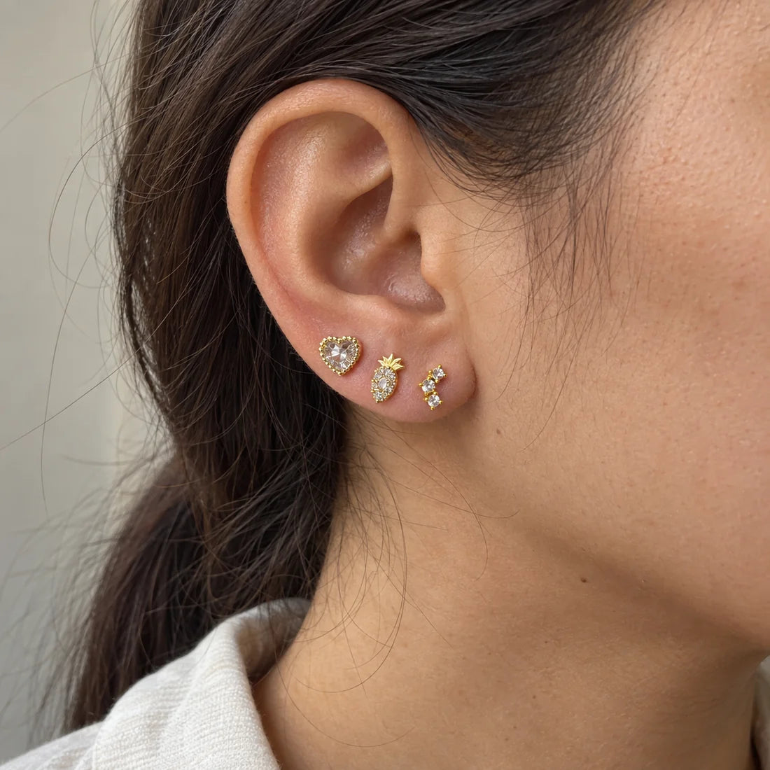 Sweet Sparkle Stud Set worn on an adult model ear
