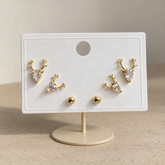 Woodland Deer Stud Set displayed on an ivory jewelry card
